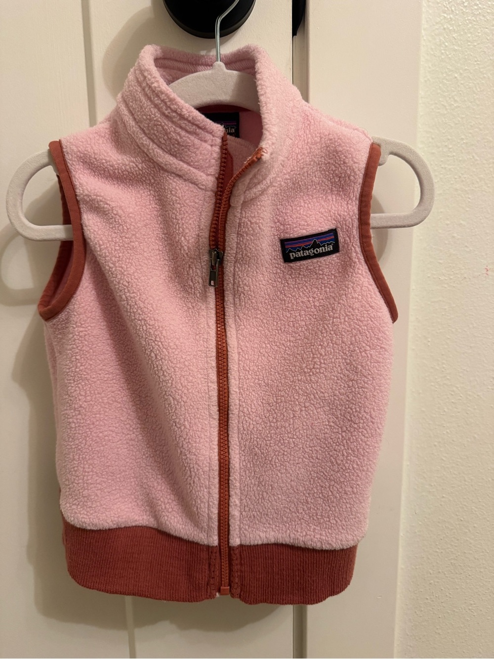 Baby’s Patagonia Pink Fleece Vest with Rust Trim